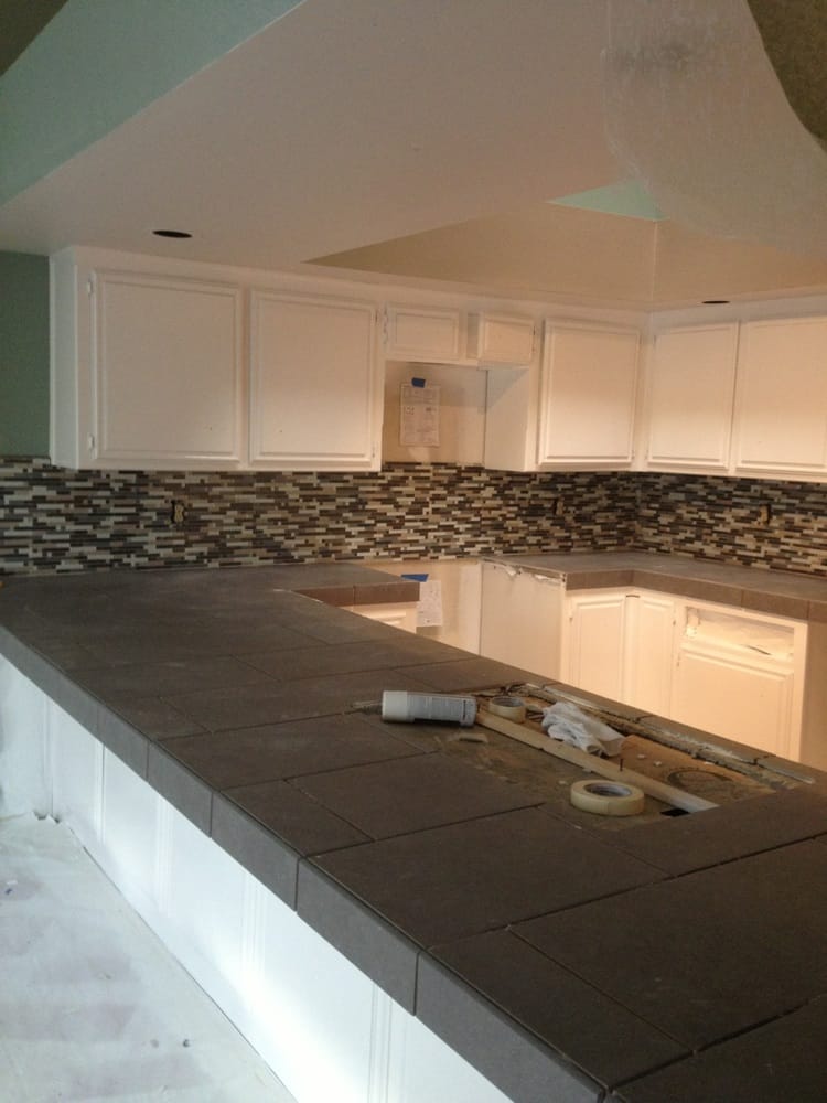 12x24 Porcelain countertops w/Glass mosaic backsplash | Yelp