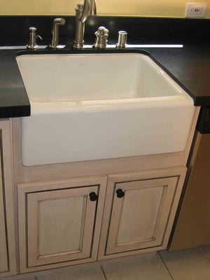Kitchen remodel with apron sink, pre-fab granite countertop. Yelp
